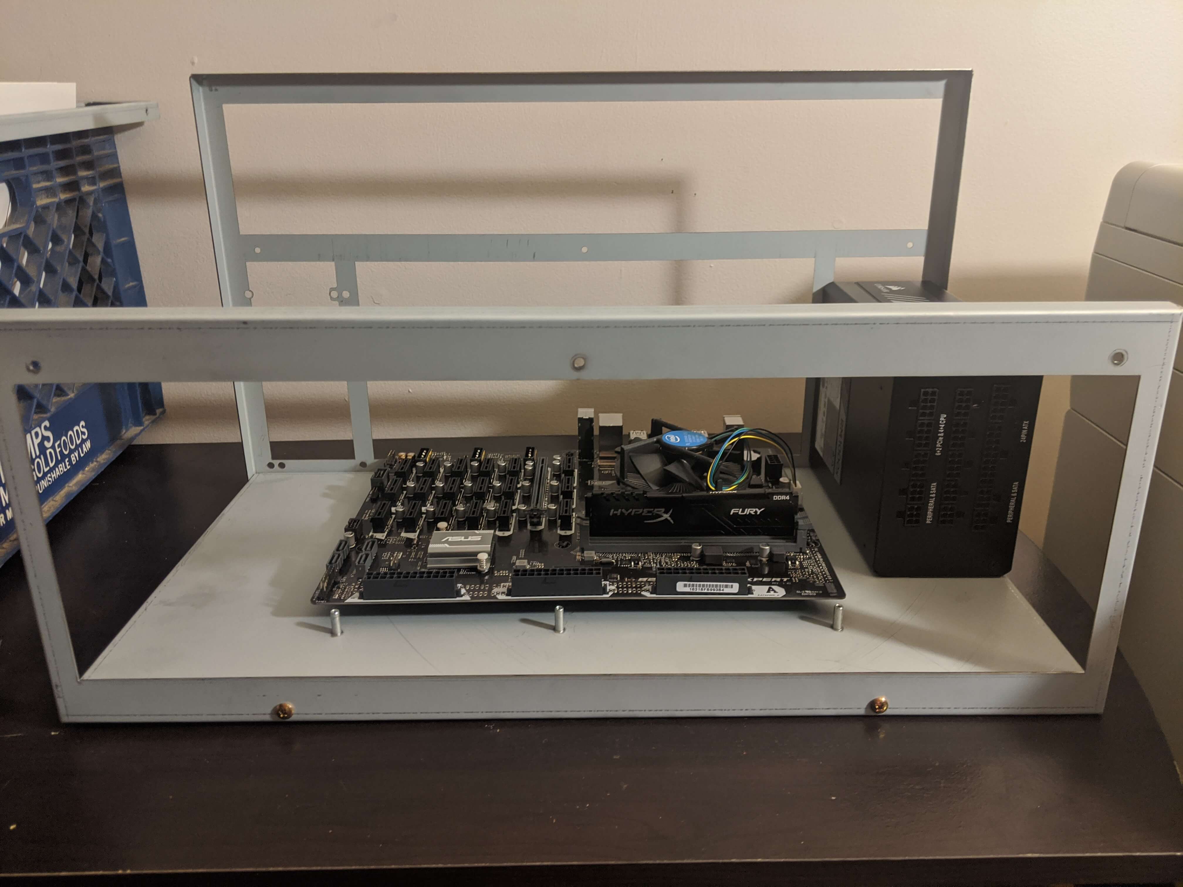 Front of rig with motherboard and PSU attached.